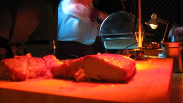 Cook cut fish and put it on plates of customers, time lapse — Stock Video