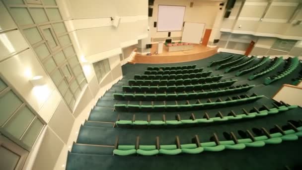 Top view panning of empty conference hall with seats — Stock Video