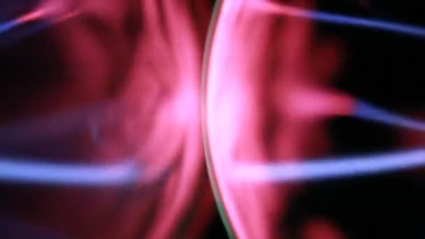 Closeup of two plasma ball, energy rays move inside — Stock Video