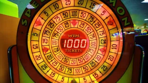 Bright red slot machine with rotating lights, child slots — Stock Video