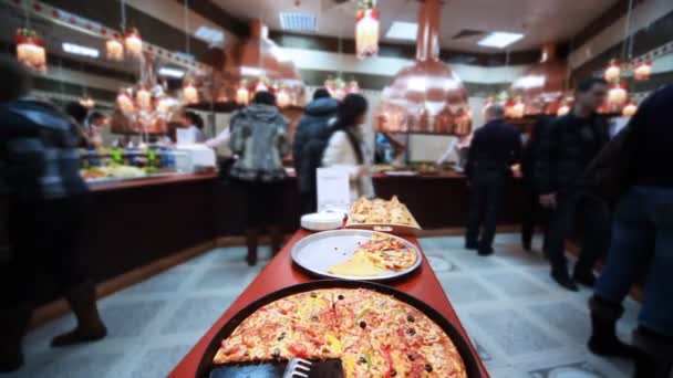 Tasty italian pizza in cafe where sells lot of good food — Stock Video