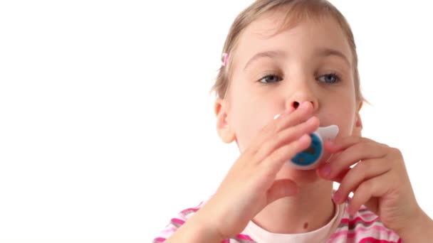 Girl holds thermometer in form nipples in mouth — Stock Video