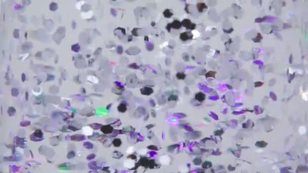 De nombreuses particules d'hexagone flottent dans l'espace de points chauds colorés — Video