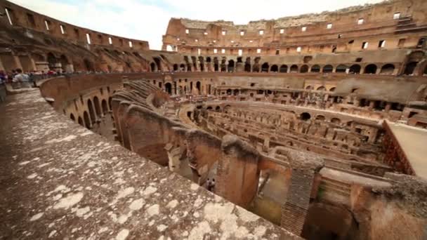 Colosseum arena area and the tunnels under it, walls divide walkway around arena — Stock Video