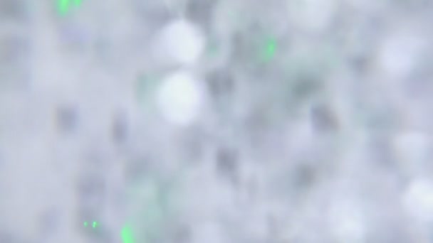 Beaucoup de taches de couleur floues coule dans l'espace 