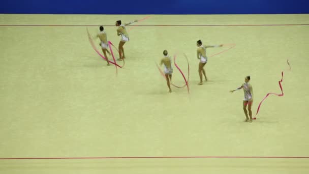 Display of gymnasts with ribbons at 30-th rhythmic gymnastics world championships — Stock Video