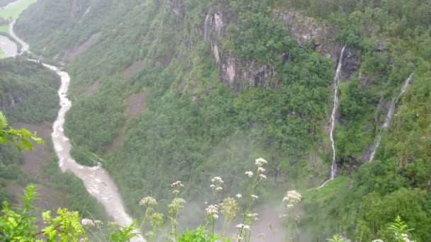 Waterfall in misty mountains near Stalheim — Stock Video