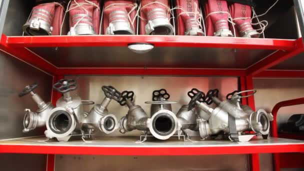 Fire hoses, pipes, cranes and other tools fire-engine compartments — Stock Video