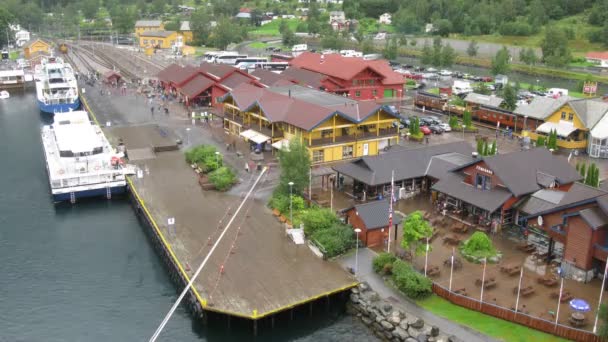 Ships at pier in little Norwegian village — Stock Video