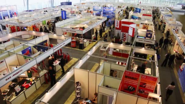 Pavilions of exhibition of fire technics at All-Russia Exhibition Centre with people — Stock Video