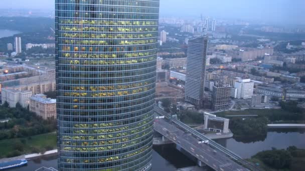 Naberezhnaya Tower or Quay Tower is an office complex in front of city landscape — Stock Video