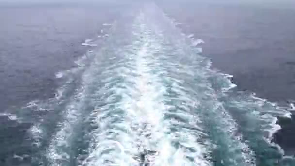 Foam left as ship go ahead, view from cruise liner stern — Stock Video