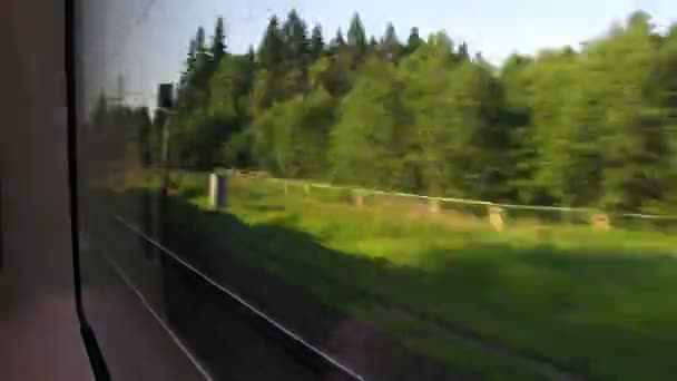 Resa med snabbtåg, vy från fönstret, tidsinställd — Stockvideo