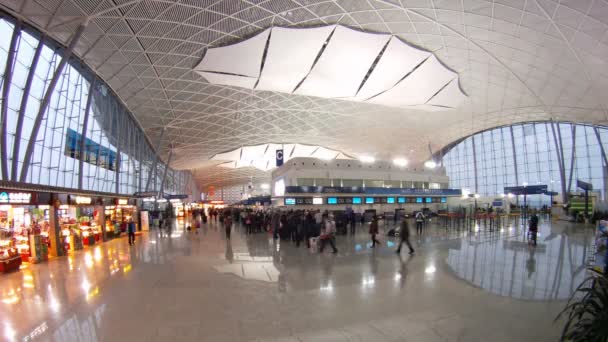 People wait for embarkation in planes in Central terminal of airport Divopu — Stock Video