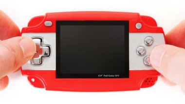adamın elleri düğmeleri taşınabilir oyun console seçeneğini tıklatın.