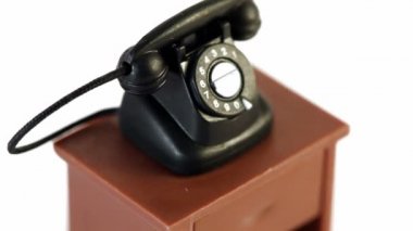 izole küçük masa spin siyah oyuncak telefon