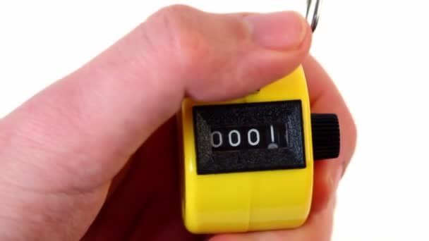 Compteur mécanique à main et bouton-poussoir pour augmenter la valeur — Video