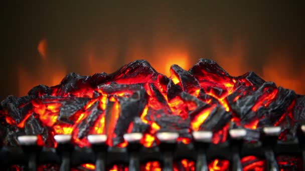 Artificial smoldering embers with small amount of fire — Stock Video
