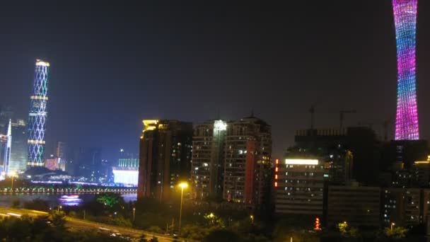 Twin Tower and TV Tower stands on against city landscape in night — Stock Video