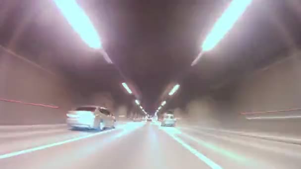 Cars leave tunnel and go on highway on Third Transport Ring — Stockvideo