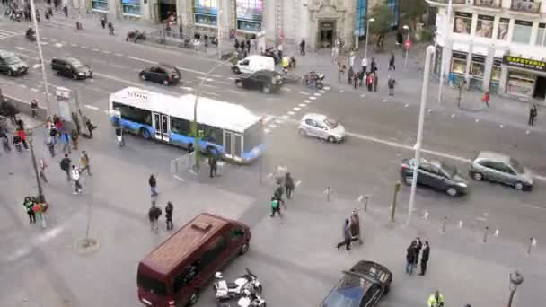 People go on crosswalk on Gran Via Street — Stock Video
