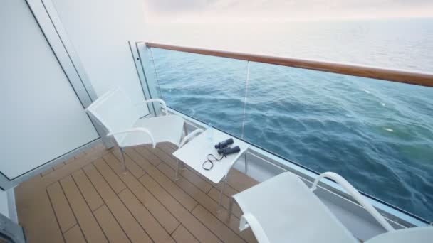 Balcony of deck of ship with transparent handrail chairs for two — Stock Video