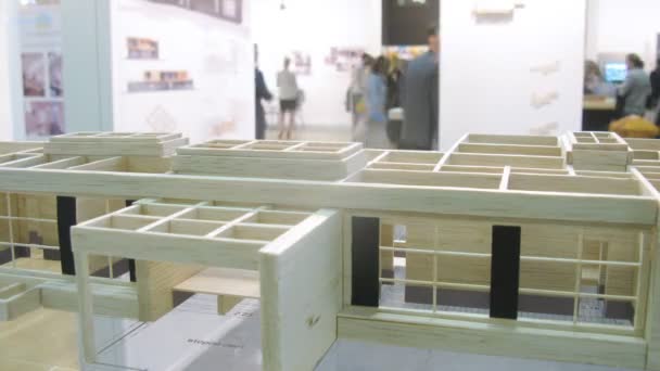 Miniature of house is presented at exhibition, time lapse — Stock Video