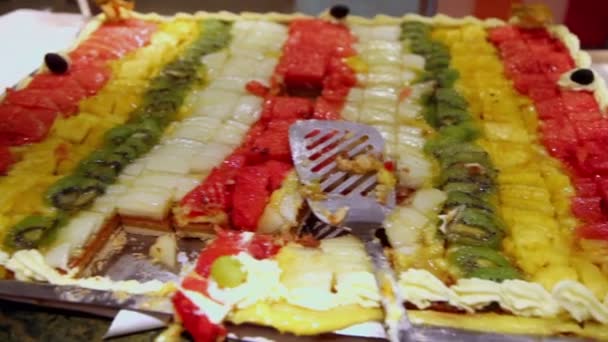 Lot of pieces of fruit cake, close up view in motion — Stock Video