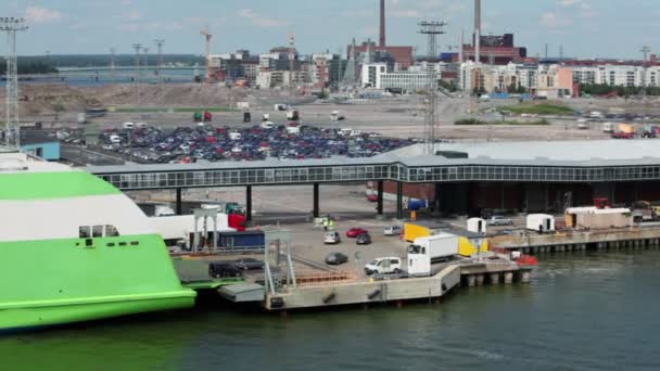 Cars ride from ferry boat in dock with huge parking — Stock Video