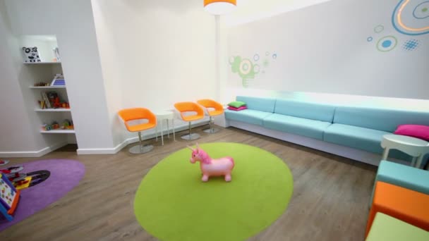 Waiting hall with furniture and toys in dental clinic — Stock Video