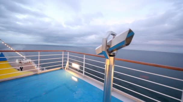 Empty main deck with viewing field-glasses and sea in distance — Stock Video