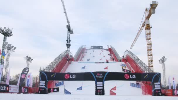 Workers prepare an artificial stage for competitions — Stock Video