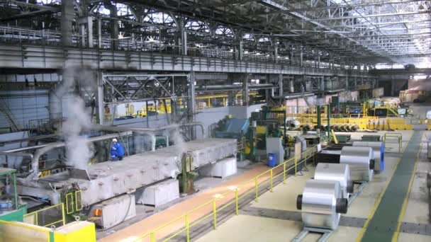 Rolls of aluminum lie in production shop of plant, time lapse — Stock Video