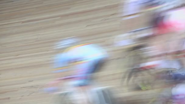 Group of bicyclists pass by track during race, closeup view — Stock Video