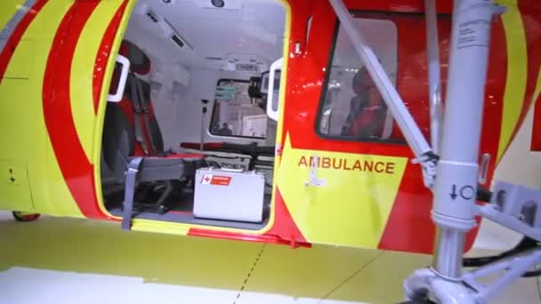 Helicopter of Ambulance stands on International exhibition — Stock Video