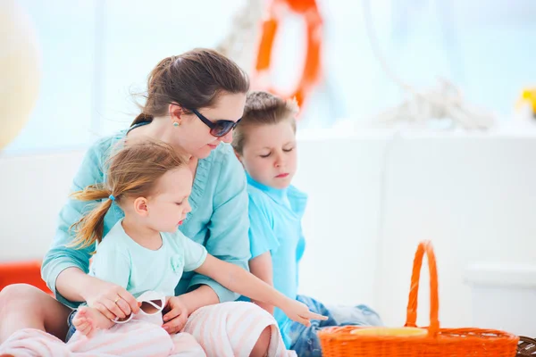 Mother and kids at luxury yacht — Stock Photo, Image