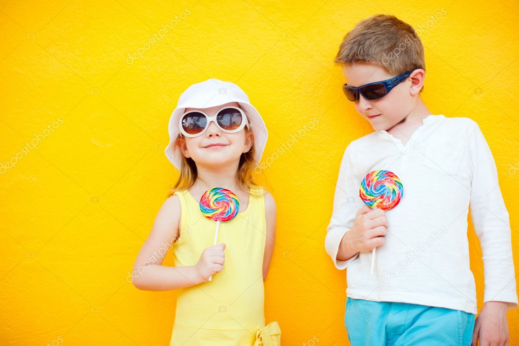 Kids with lollipops