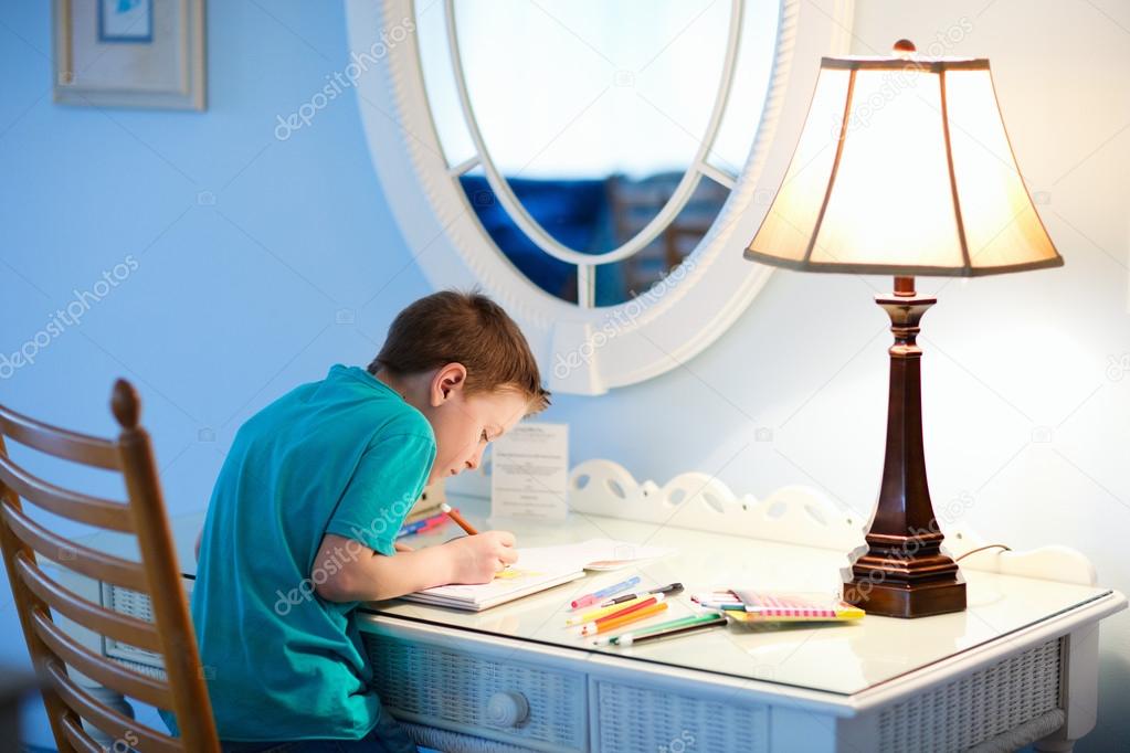 Little boy drawing or writing