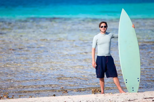Young man with surfboard — Stock Photo, Image
