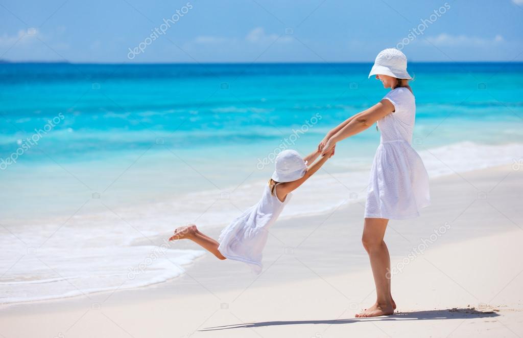 Mother and daughter at beach