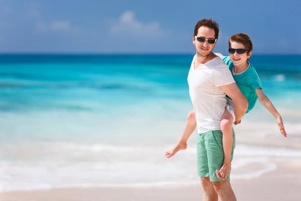 Father and son at beach — Stock Photo, Image