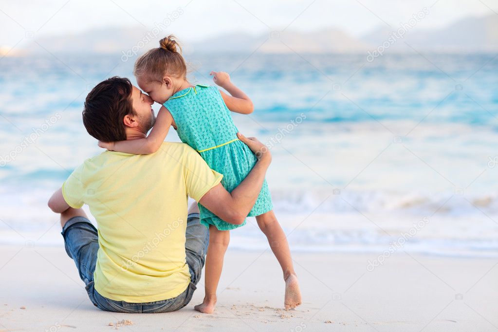 Father and daughter at beach