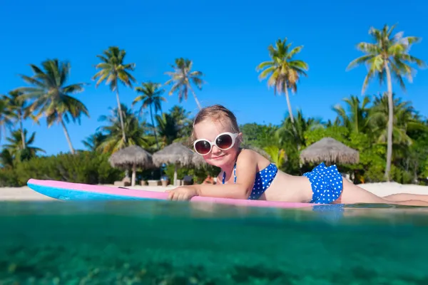 Little girl swimming Royalty Free Stock Images