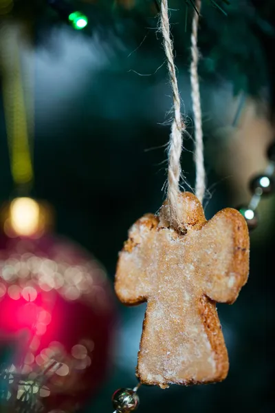 Gingerbread cookies on Christmas tree — Stock Photo, Image