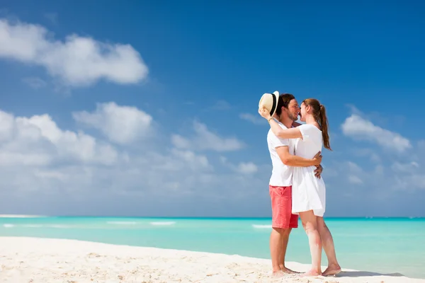 Couple standing at beach Stock Image