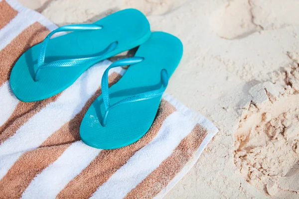 Flip flops at beach Stock Picture