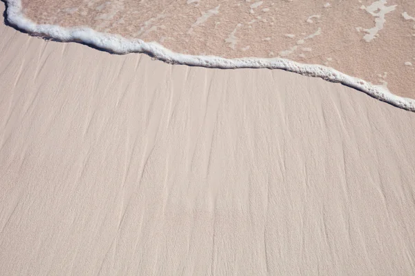 Fond de sable avec vague — Photo