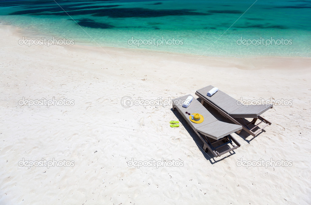 Lounge chairs on a beach