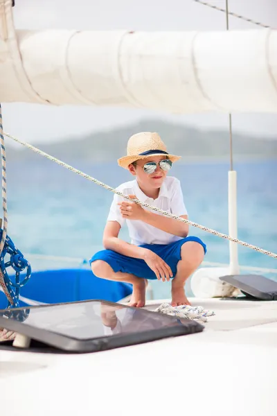 Teenage boy at luxury yacht — Stock Photo, Image