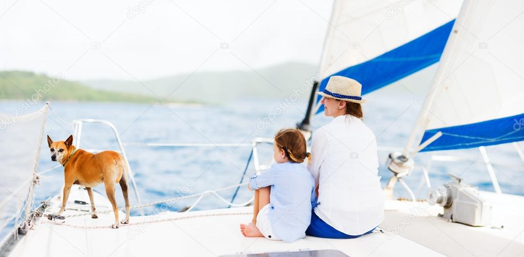 Family sailing on a luxury yacht